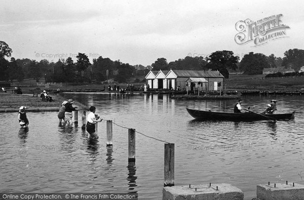 Playing in The Lake, Wicksteed Park 1922, Kettering. The Frith logo will not 